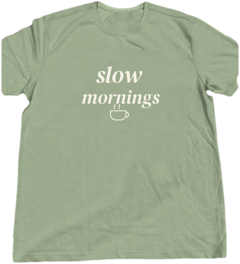 Slow Mornings T-shirt on a hanger